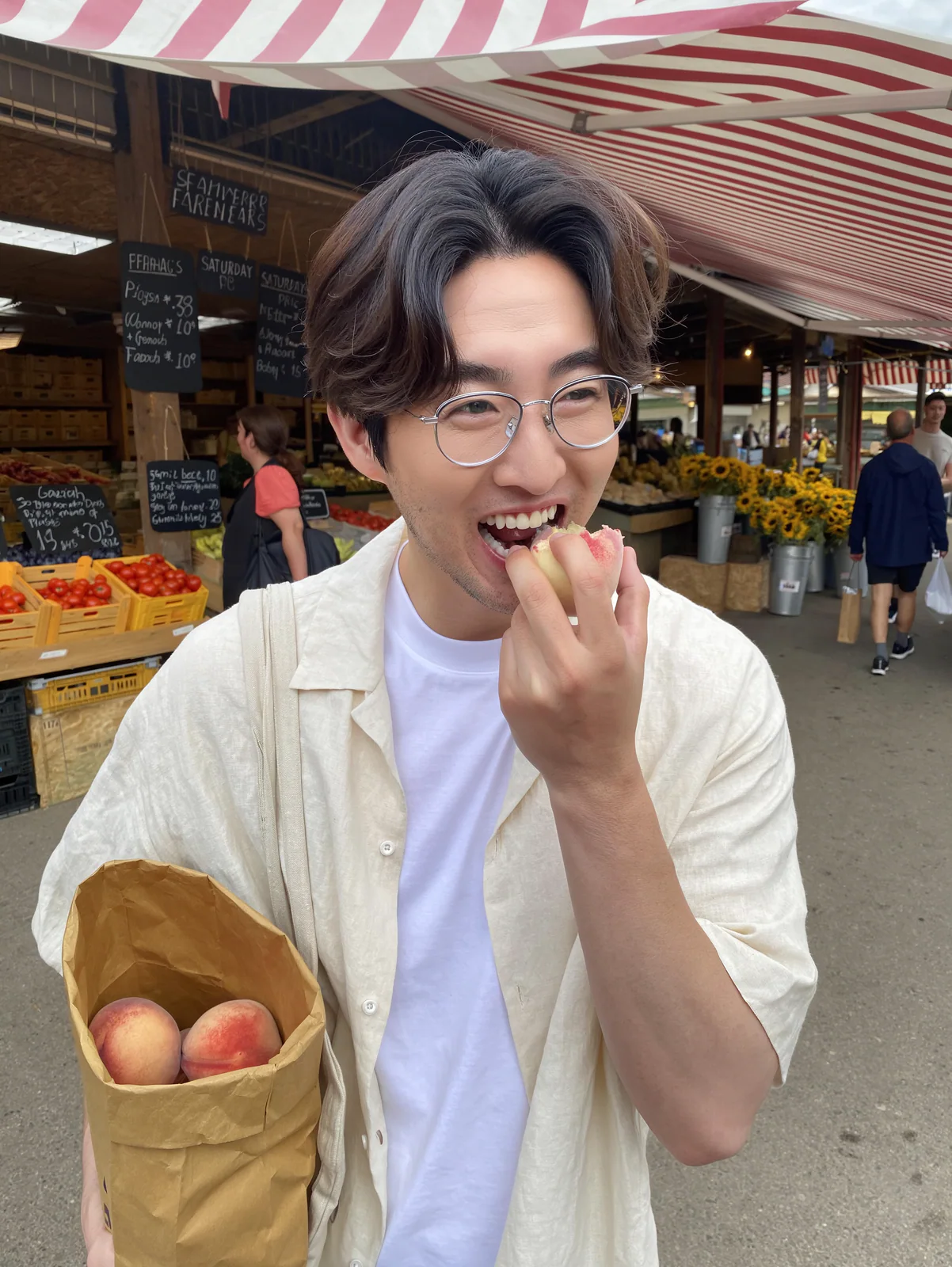 MOSS Image candid photo of a young man biting a peach at a street market