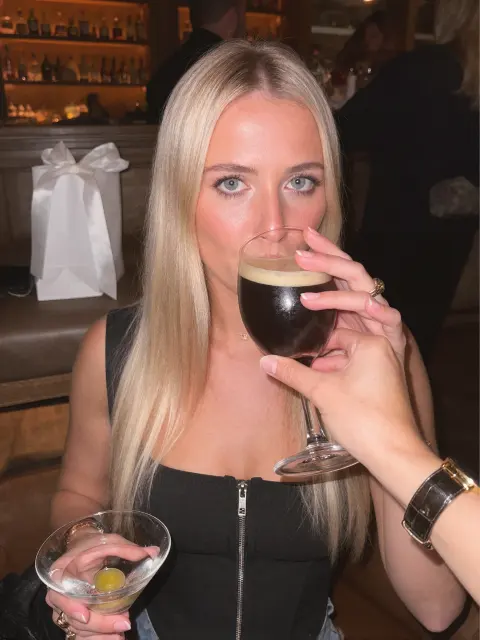 AI photo of a woman with long straight blonde hair: espresso martini sip, made with KREA 2